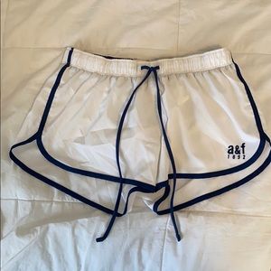 white and blue athletic shorts